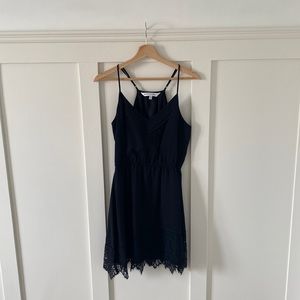 Black spaghetti strap racerback flowy dress with lace.